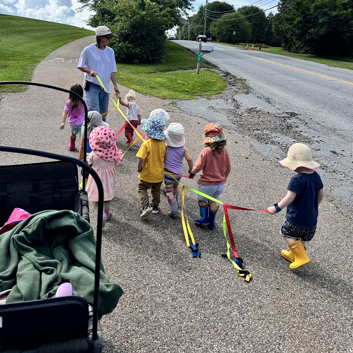Kid's walking in grass